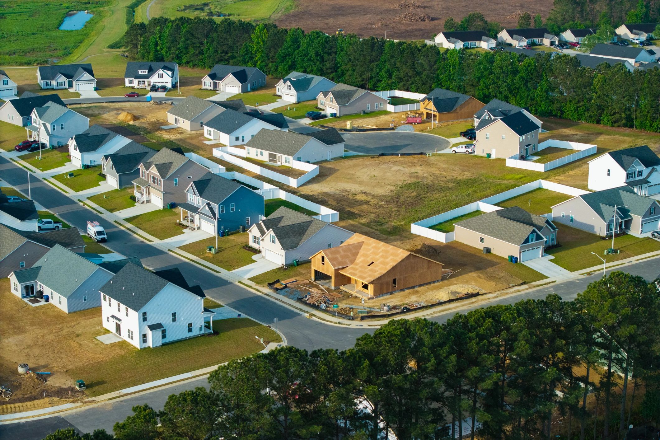 Aerial view of neighborhood homes under construction